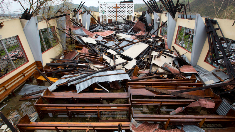 Saint Anne church lays totally destroyed by Hurricane Matthew in Camp Perrin, a district of Les Cayes, Haiti, Thursday, Oct. 6, 2016. Two days after the storm rampaged across the country’s remote southwestern peninsula, authorities and aid workers still lack a clear picture of what they fear is the country’s biggest disaster in years. (Image: AP)
